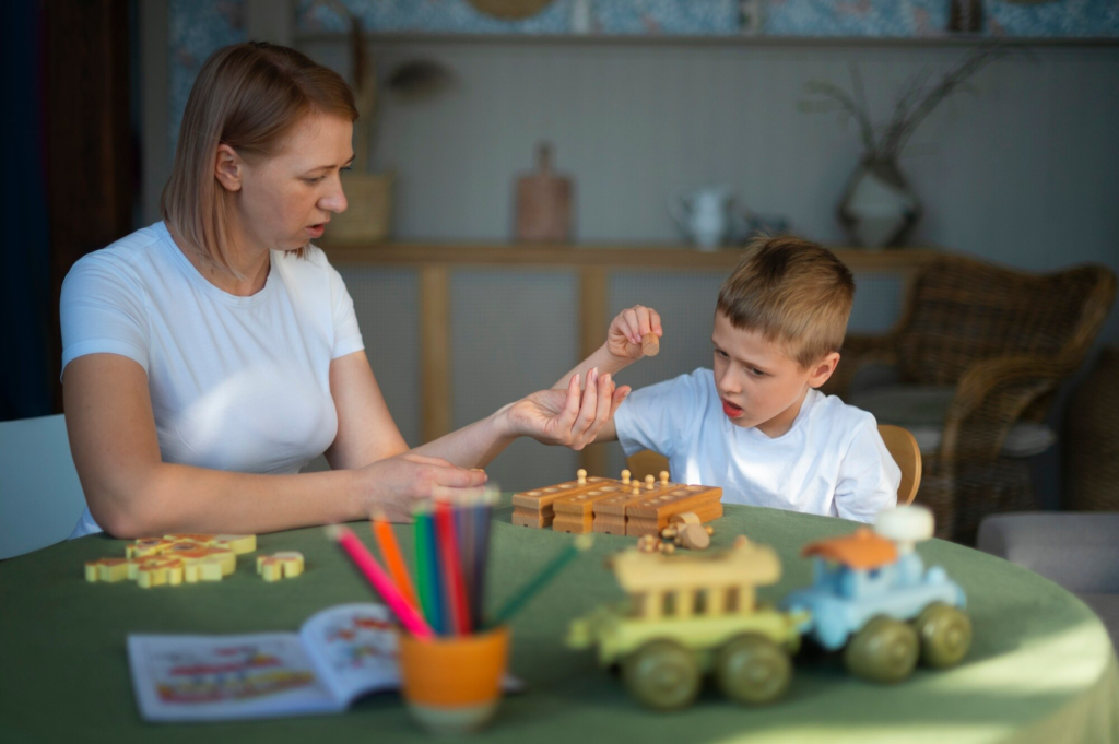 Therapist helping a kid who has autism with different therapy techniques